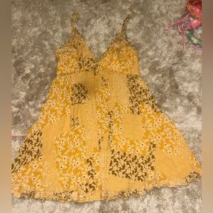 Adorable orange/yellow colored dress, from Angel Biba. Built in under skirt too!